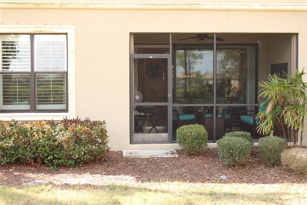 13711 Messina Loop, Unit 104 Bradenton, FL 34211 - Photo 40 of 70 a view of a door in front of a house
