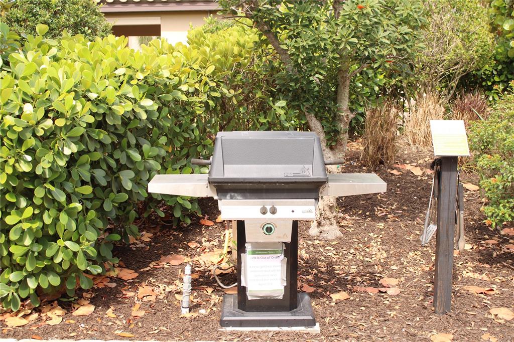 13711 Messina Loop, Unit 104 Bradenton, FL 34211 - Photo 52 of 70 a view of a yard with plants