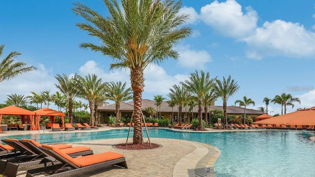 13711 Messina Loop, Unit 104 Bradenton, FL 34211 - Photo 55 of 70 a front view of a house with garden