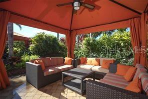 13711 Messina Loop, Unit 104 Bradenton, FL 34211 - Photo 65 of 70 a outdoor living space with furniture and garden view