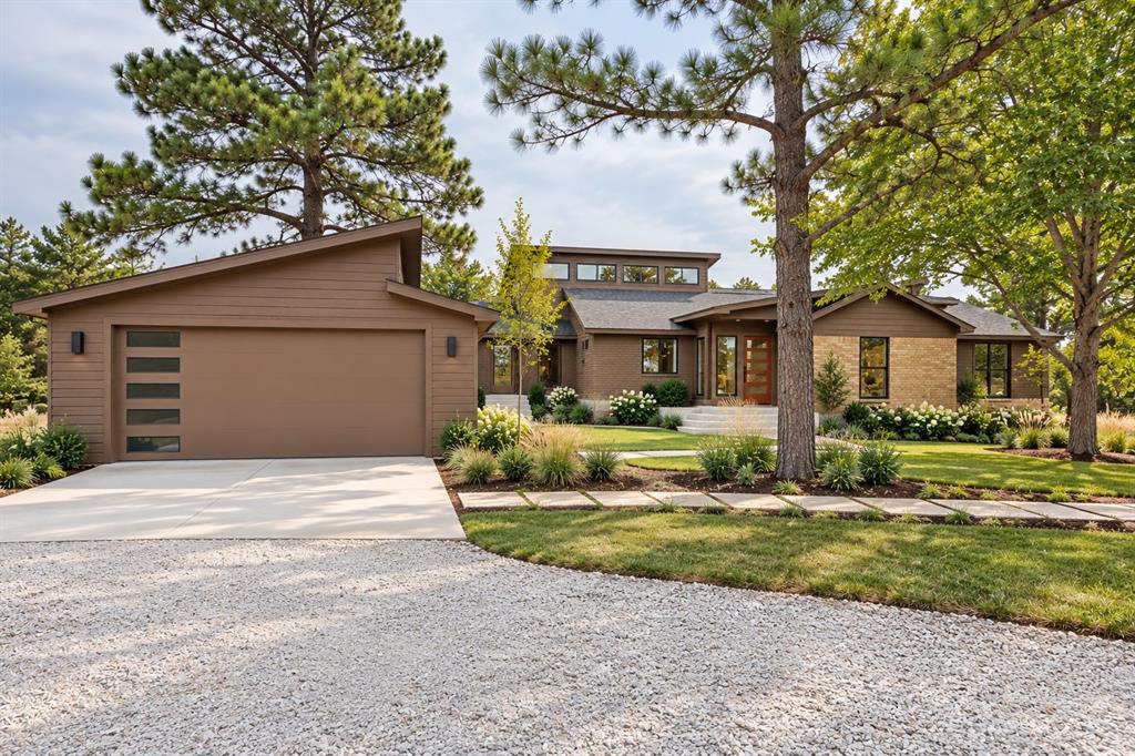 Front of home with ai generated landscaping