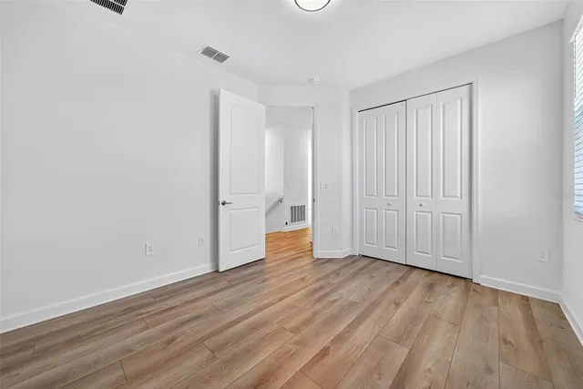 an aerial view of a city with lawn chairs