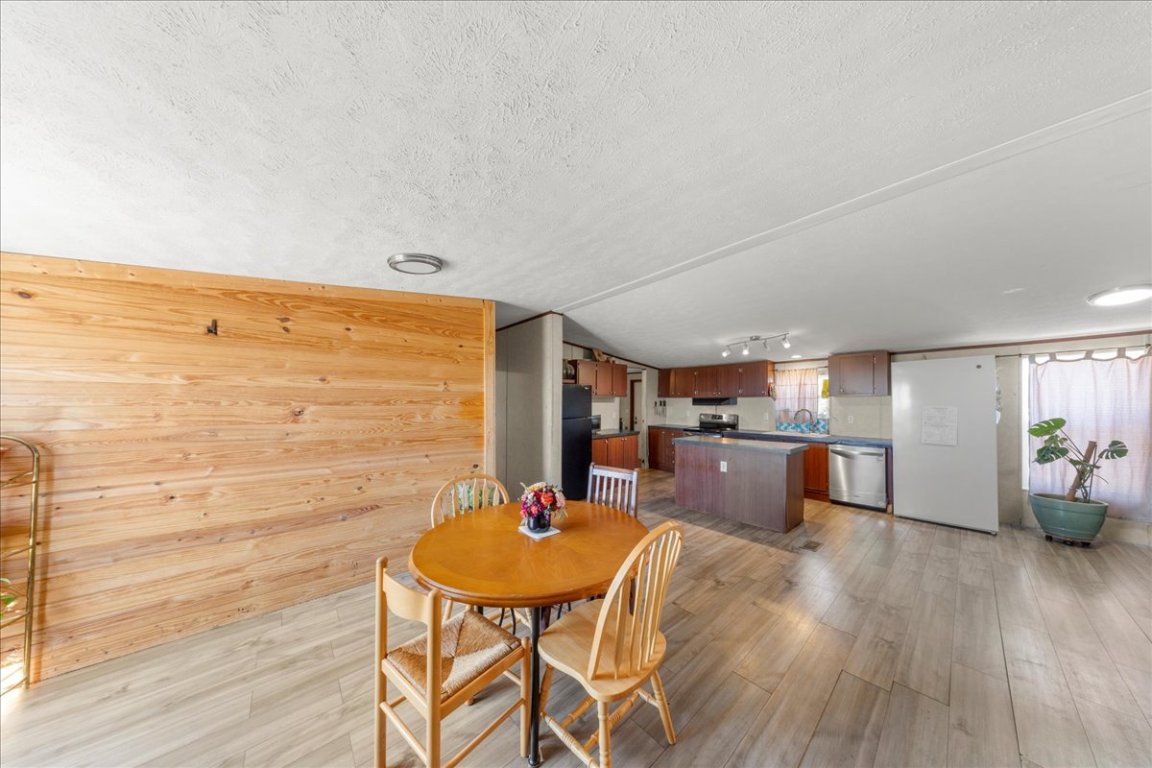 1307 Graef Road, Unit B Kyle, TX 78640 - Photo 16 of 40 a living room with furniture and a wooden floor