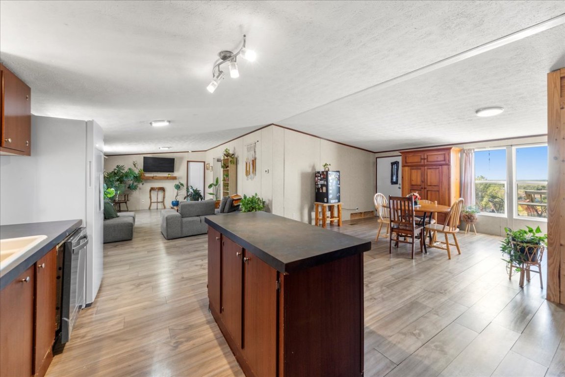 1307 Graef Road, Unit B Kyle, TX 78640 - Photo 20 of 40 a kitchen with lots of counter top space and furniture