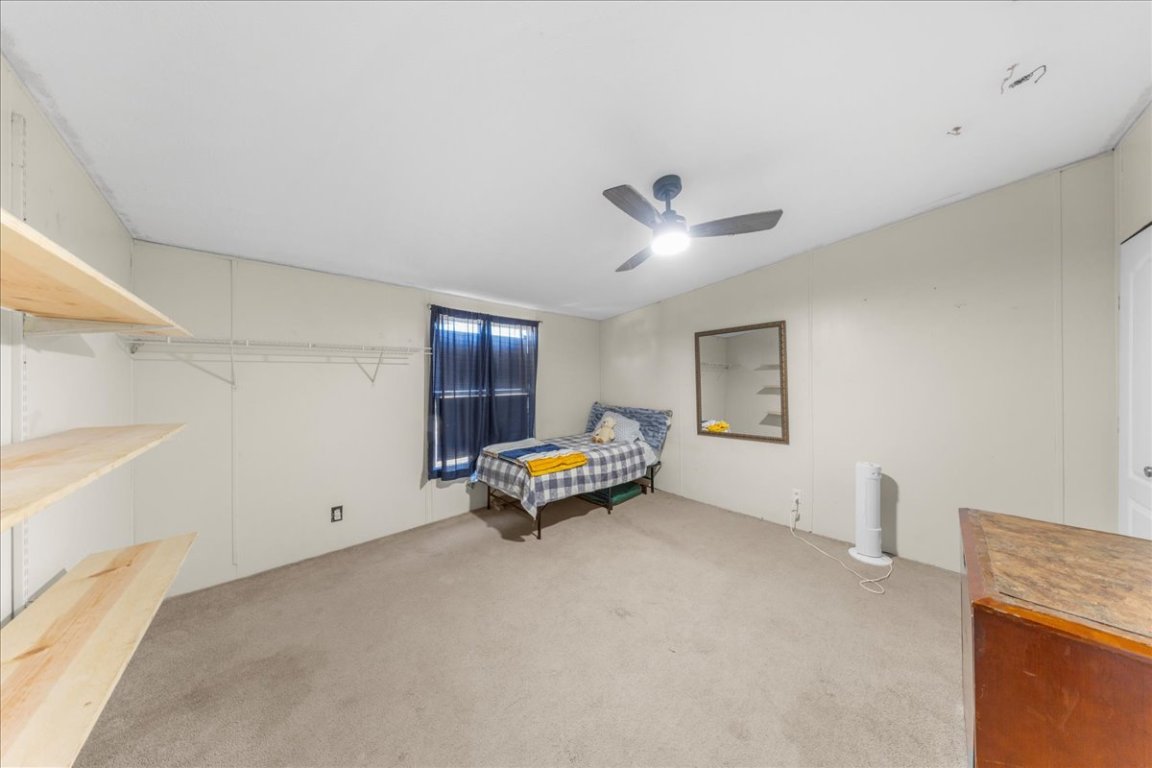 1307 Graef Road, Unit B Kyle, TX 78640 - Photo 33 of 40 a living room with furniture and a ceiling fan