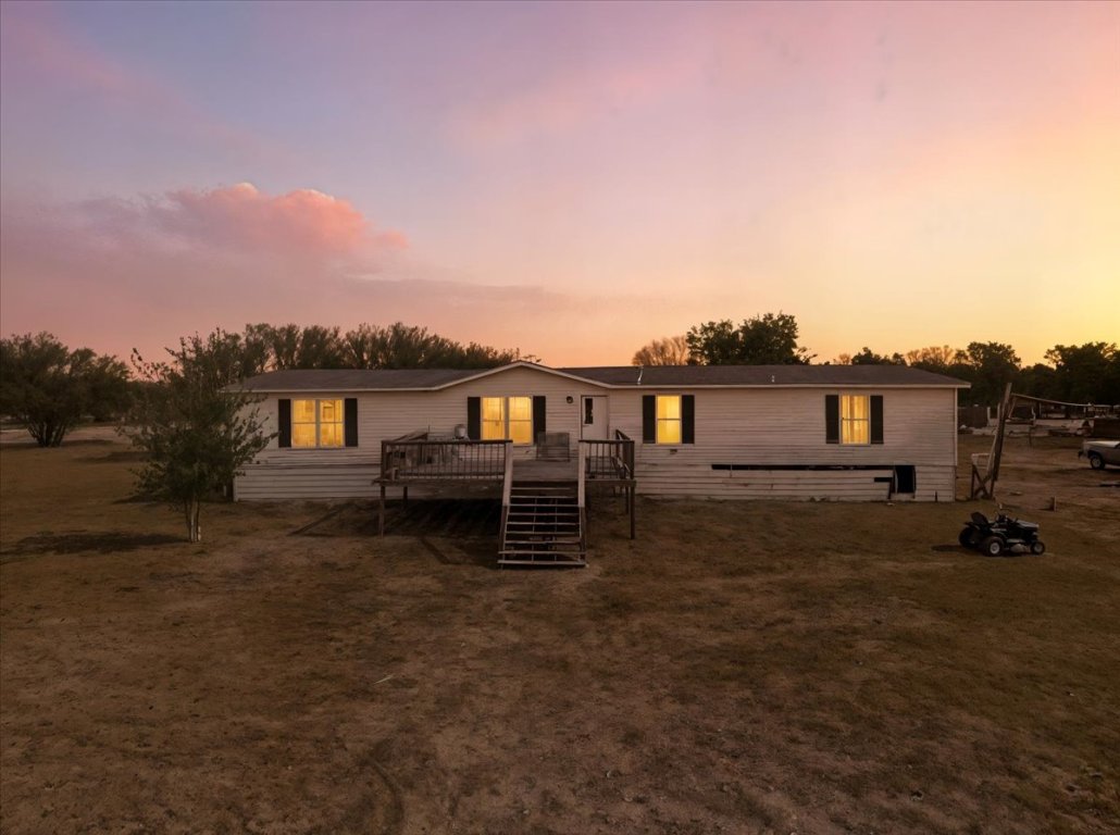 1307 Graef Road, Unit B Kyle, TX 78640 - Photo 5 of 40 a view of a house with a yard