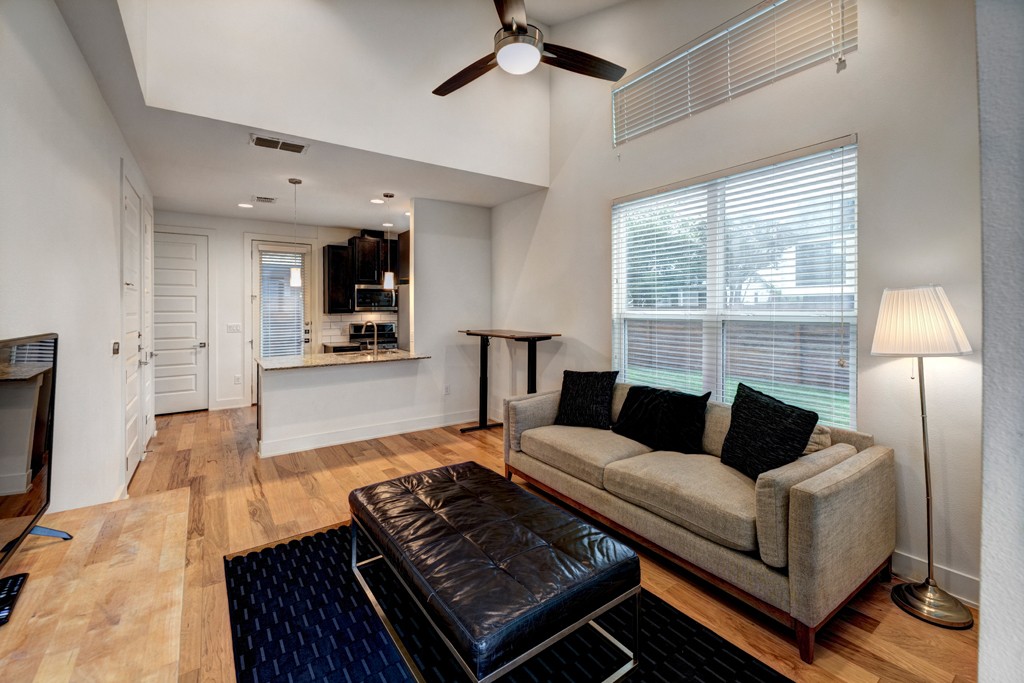 1300 Walnut Avenue, Unit B Austin, TX 78702 - Photo 4 of 15 a living room with furniture and a fireplace