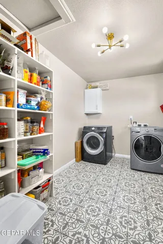 a view of a bedroom with wooden floor and bathroom