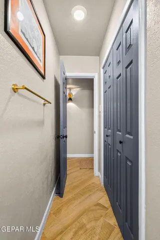 a bedroom with a bed and a table in it