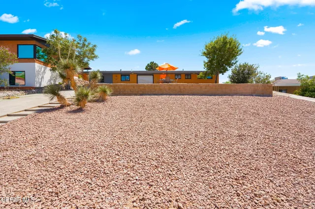 a view of a houses with a yard