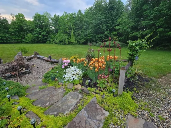 a view of a garden from a balcony