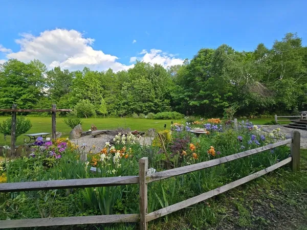 a view of a lake with a yard