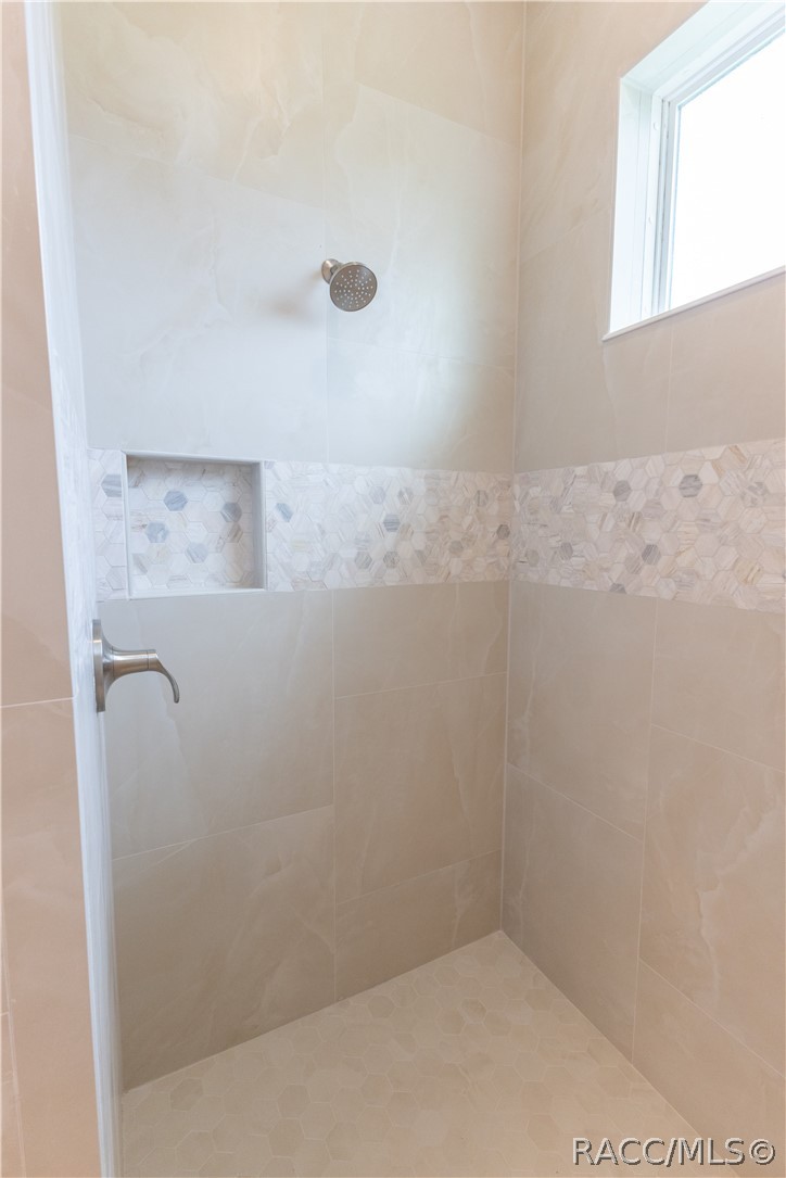 1439 Cr212 Road Oxford, FL 34484 - Photo 23 of 48 Shower in primary bathroom