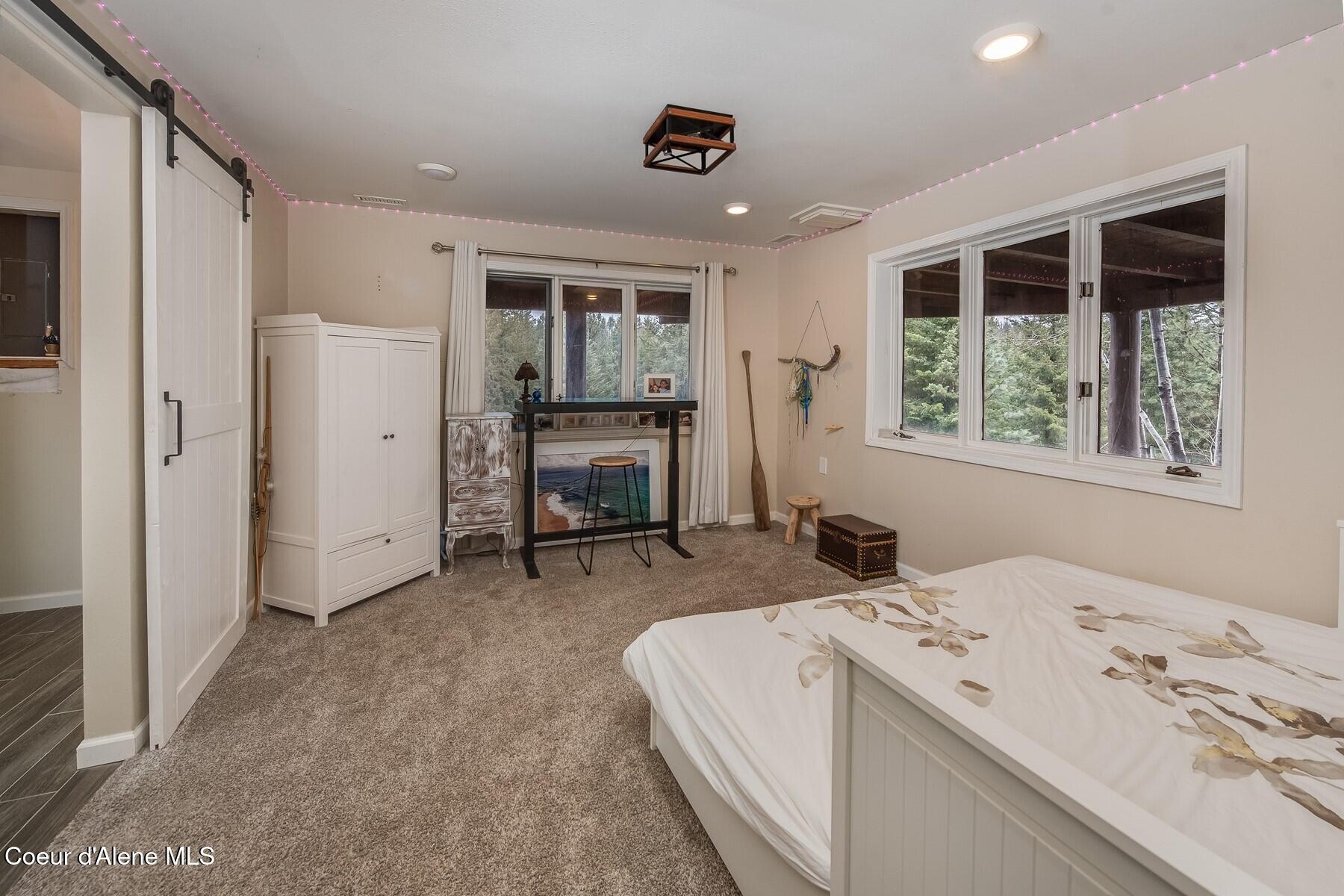 480 Sunnyside Ridge Road Sandpoint, ID 83864 - Photo 58 of 81 Lower Level Master Bedroom