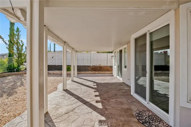 a view of a ocean with a palm tree