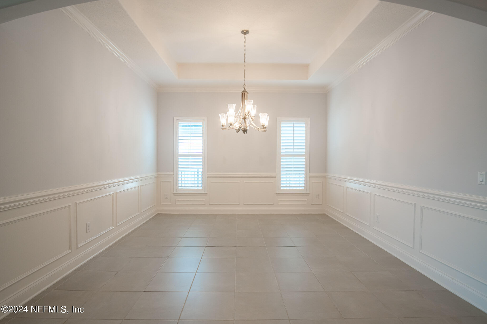 375 Silver Pine Drive St. Augustine, FL 32092 - Photo 15 of 84 a view of a room with window and chandelier