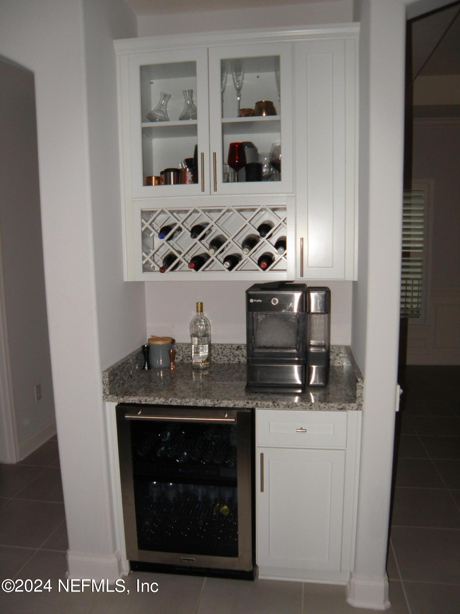 375 Silver Pine Drive St. Augustine, FL 32092 - Photo 21 of 84 a kitchen with stainless steel appliances granite countertop a stove and a microwave