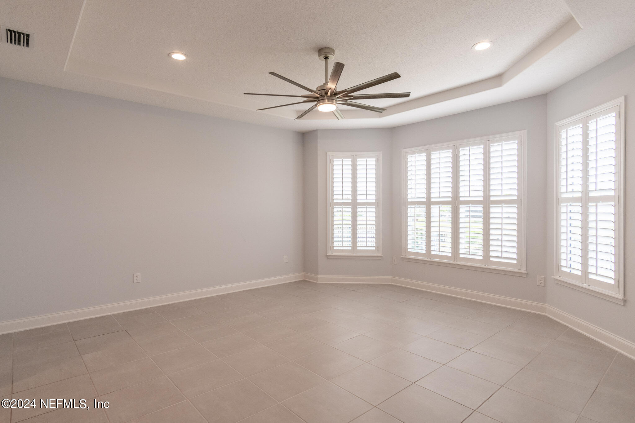 375 Silver Pine Drive St. Augustine, FL 32092 - Photo 24 of 84 a view of an empty room with a window