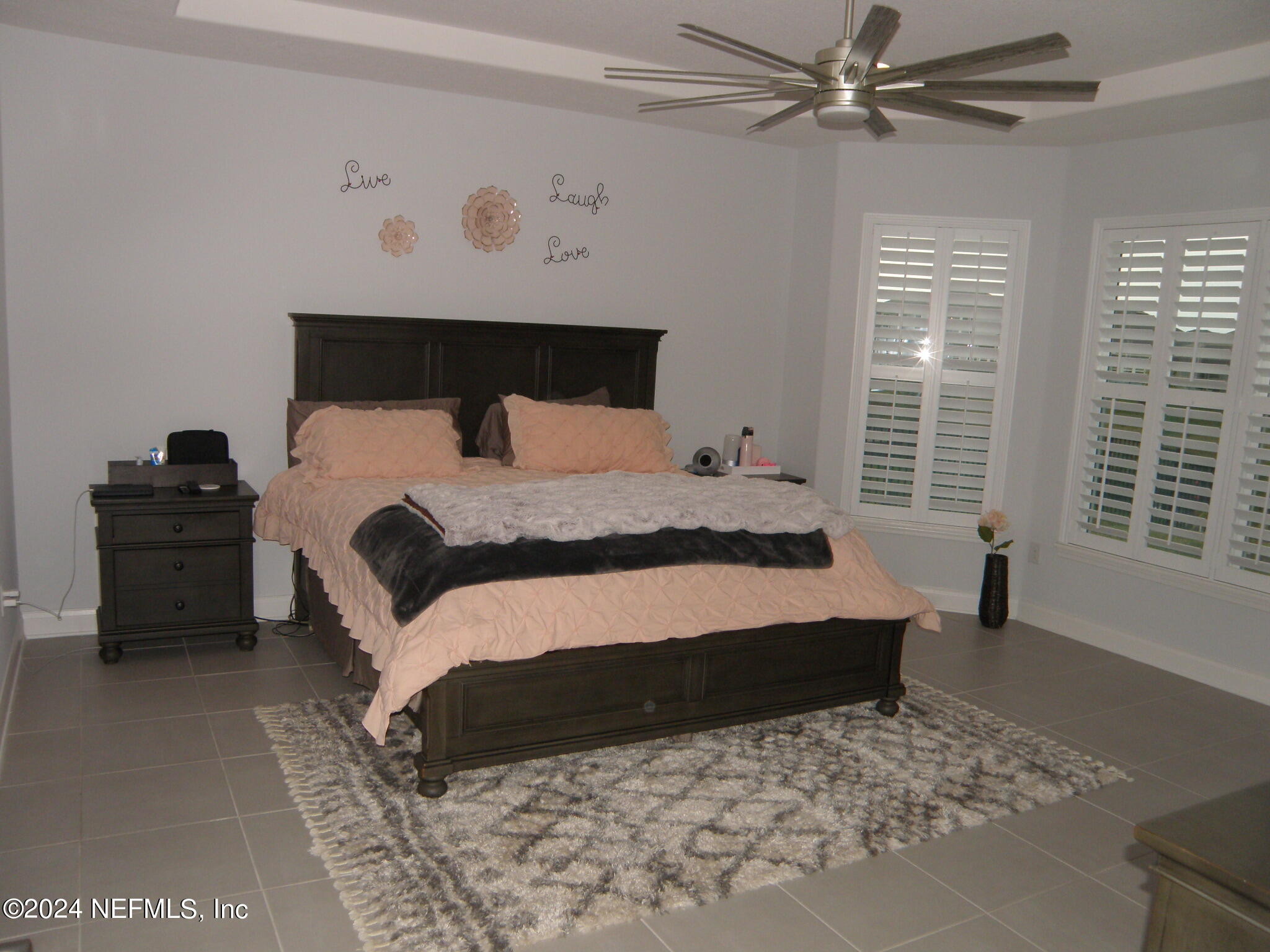 375 Silver Pine Drive St. Augustine, FL 32092 - Photo 25 of 84 a bedroom with a bed and a window