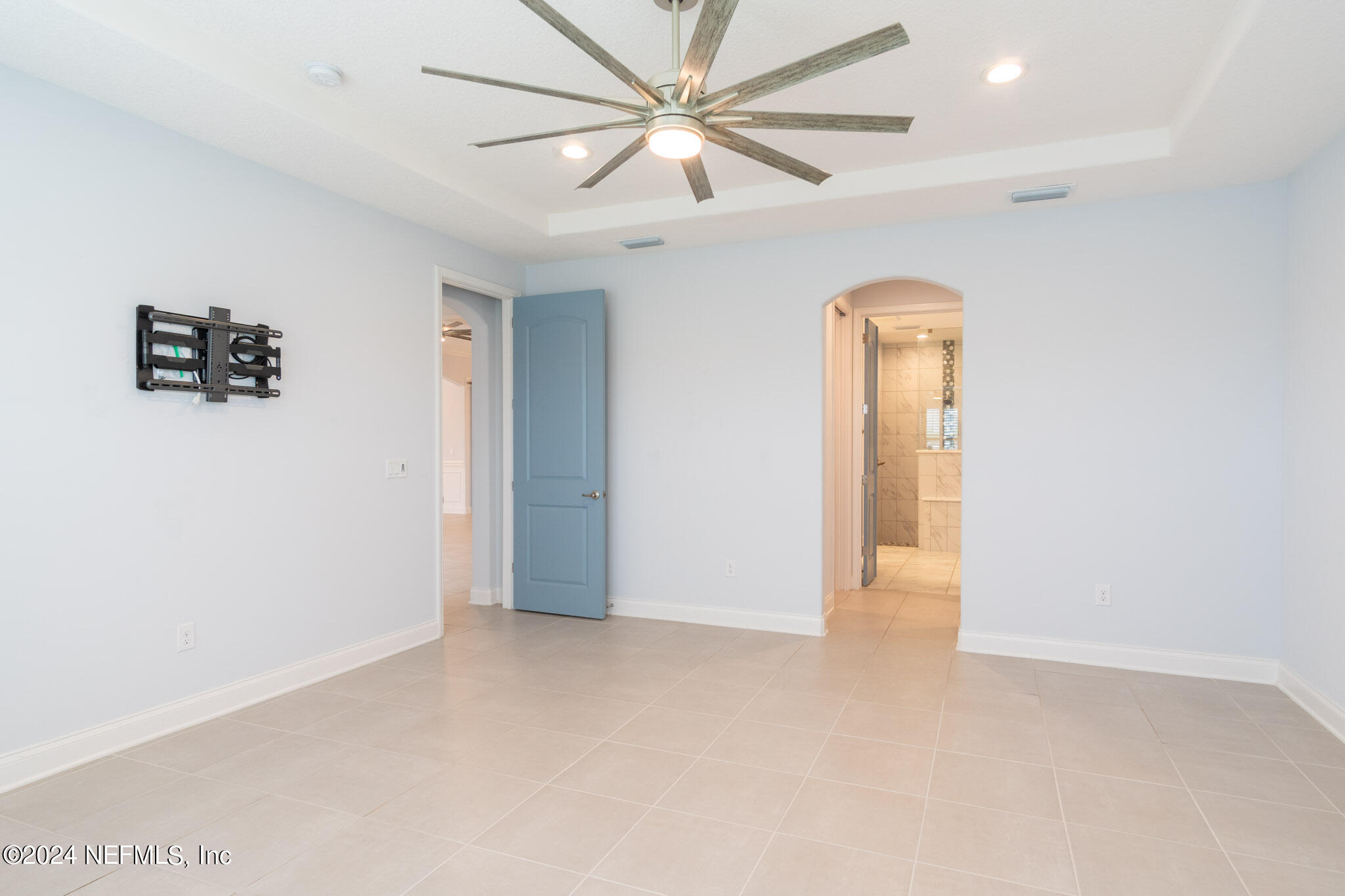 375 Silver Pine Drive St. Augustine, FL 32092 - Photo 27 of 84 an empty room with closet and a chandelier fan