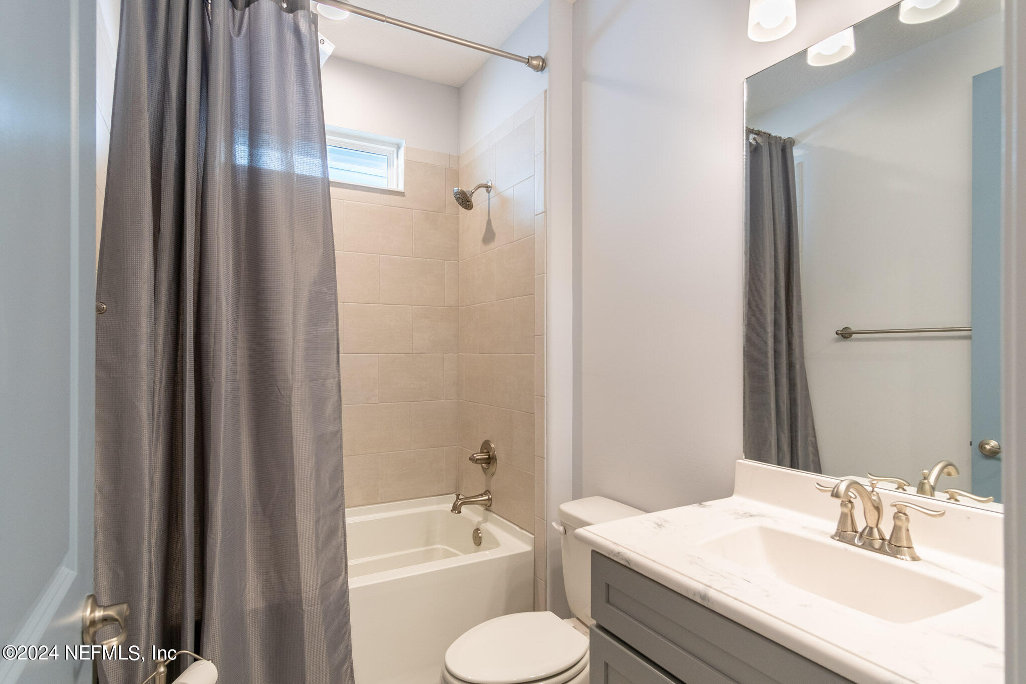 375 Silver Pine Drive St. Augustine, FL 32092 - Photo 39 of 84 a bathroom with a sink toilet and shower