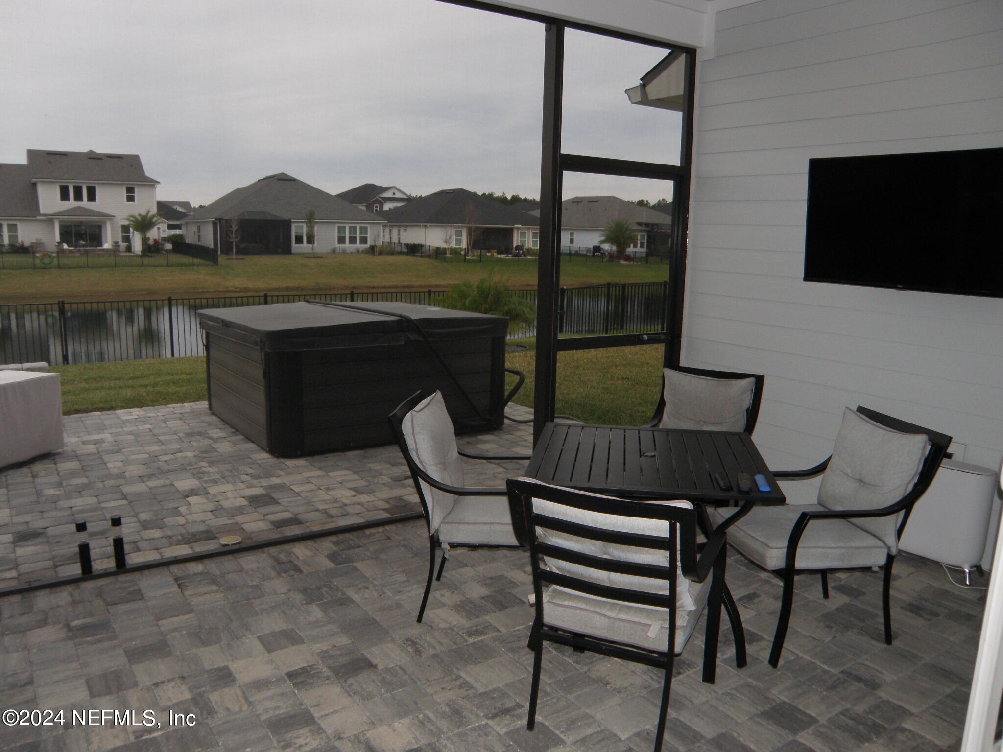 375 Silver Pine Drive St. Augustine, FL 32092 - Photo 45 of 84 a view of a chairs and table in patio