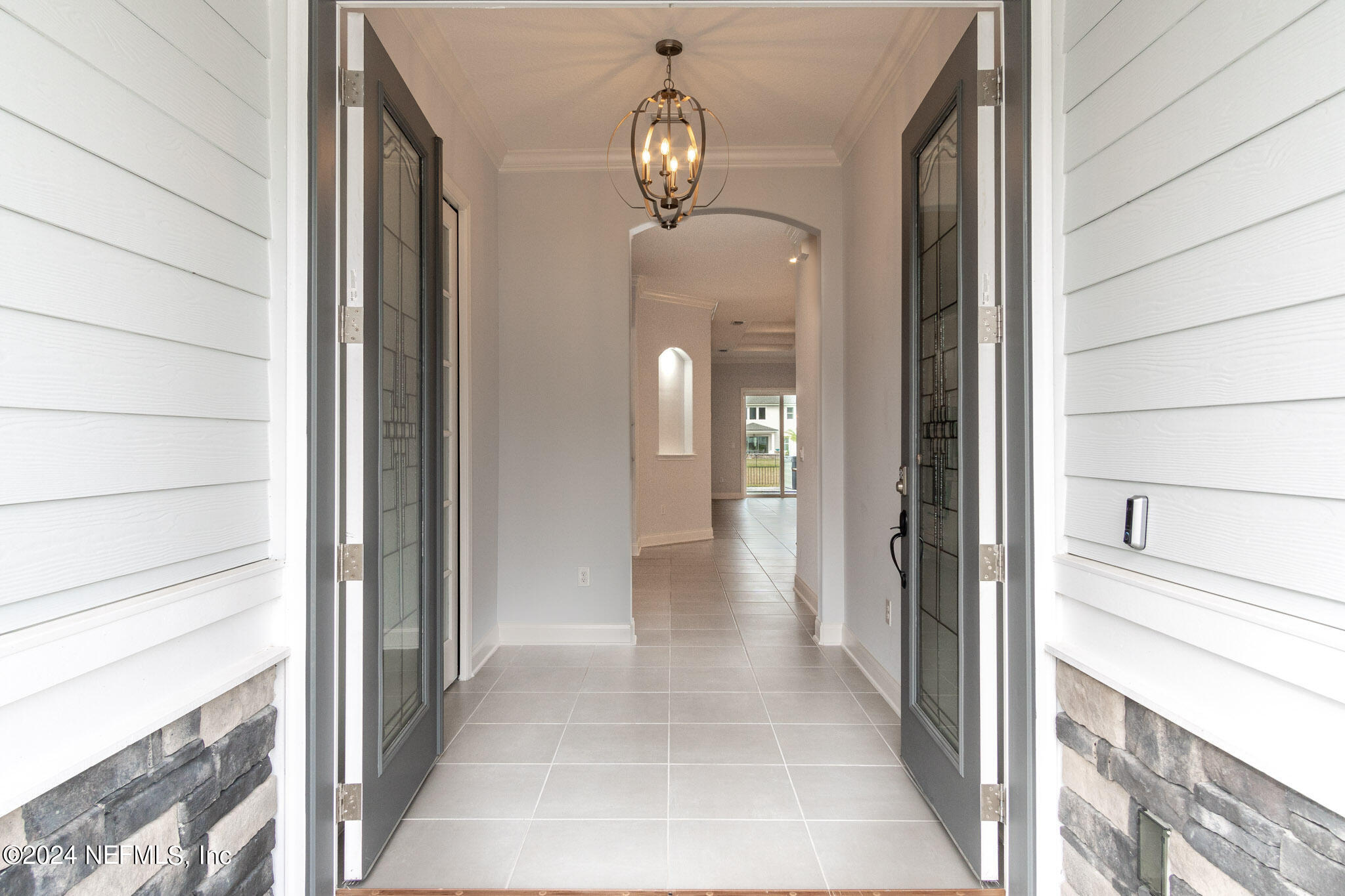 375 Silver Pine Drive St. Augustine, FL 32092 - Photo 6 of 84 a view of a hallway with wooden floor