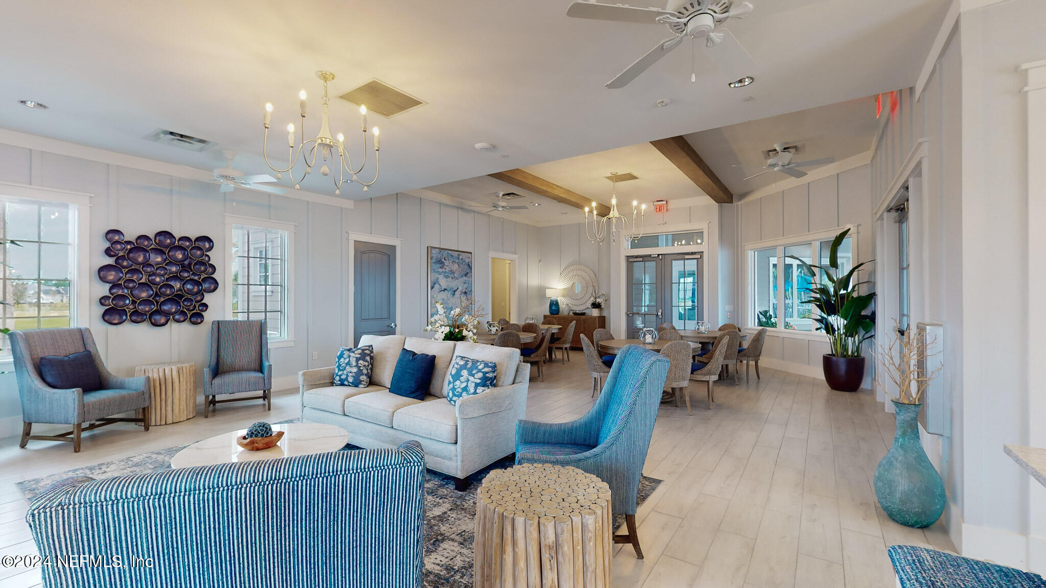 375 Silver Pine Drive St. Augustine, FL 32092 - Photo 74 of 84 a living room with furniture and a chandelier
