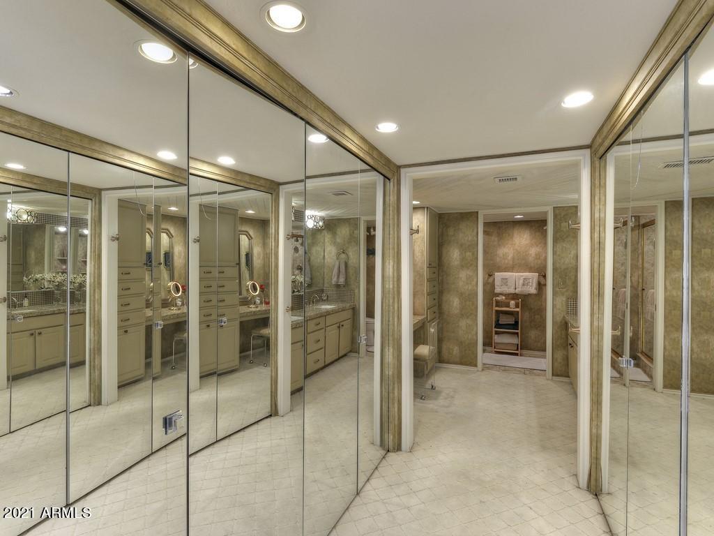 4446 East Camelback Road, Unit 109 Phoenix, AZ 85018 - Photo 13 of 29 His/Hers Closets