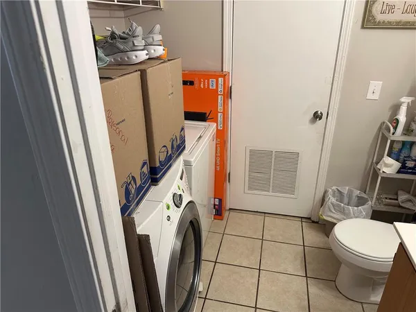a bathroom with a sink and toilet