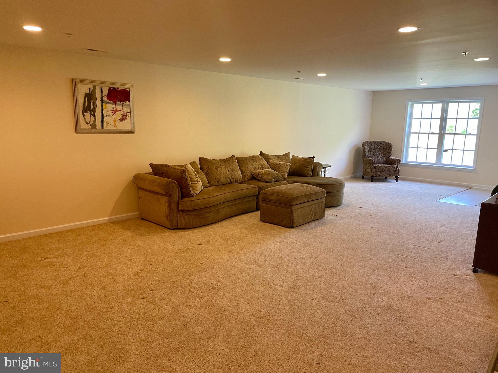 8258 Academy Road, Unit 6 Ellicott City, MD 21043 - Photo 25 of 36 Bright & expansive basement