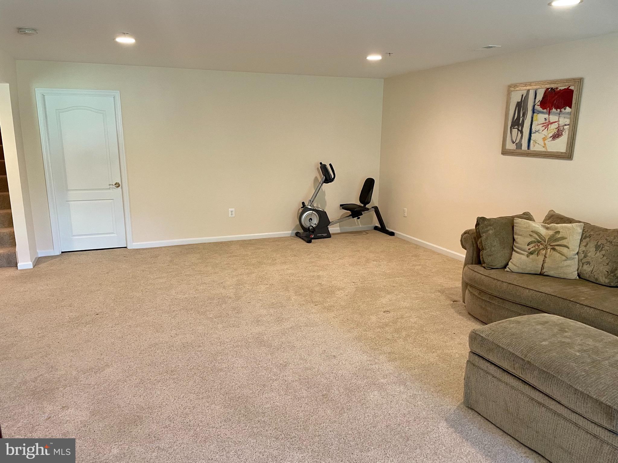 8258 Academy Road, Unit 6 Ellicott City, MD 21043 - Photo 26 of 36 Family room 2