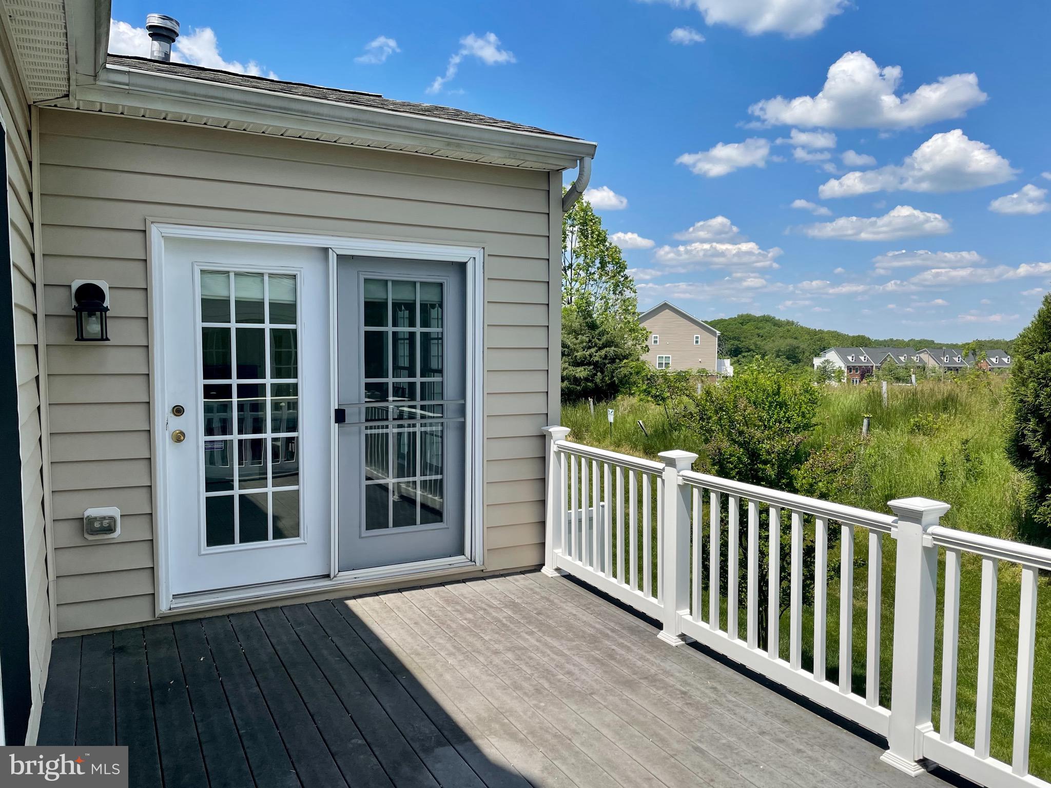 8258 Academy Road, Unit 6 Ellicott City, MD 21043 - Photo 32 of 36 French doors to deck