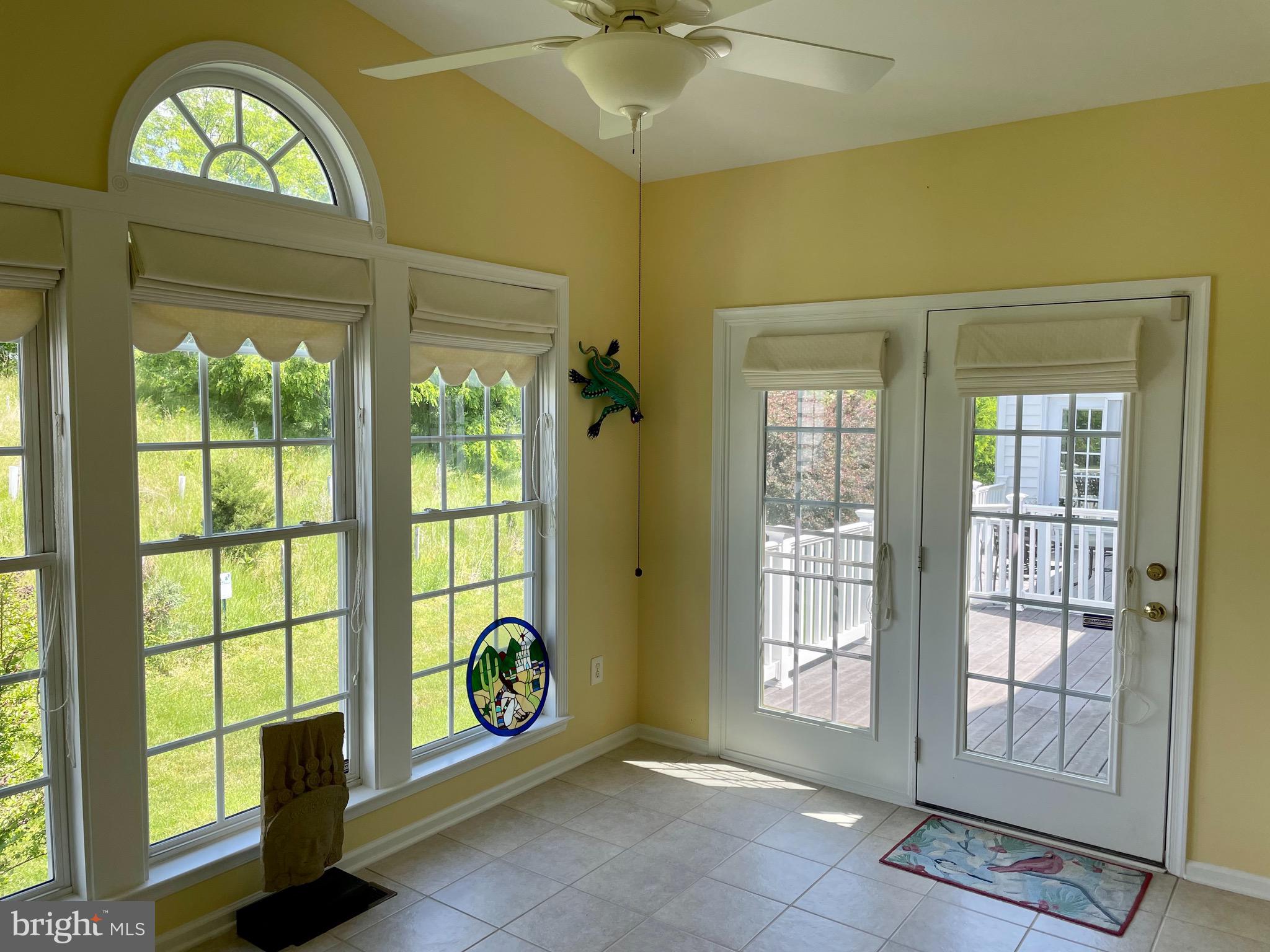 8258 Academy Road, Unit 6 Ellicott City, MD 21043 - Photo 7 of 36 Bright sunroom