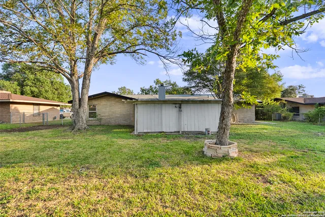 a house view with a garden space