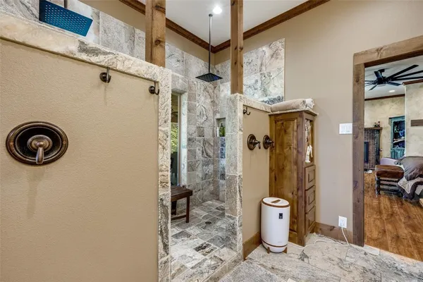 a view of a hallway with entryway and furniture