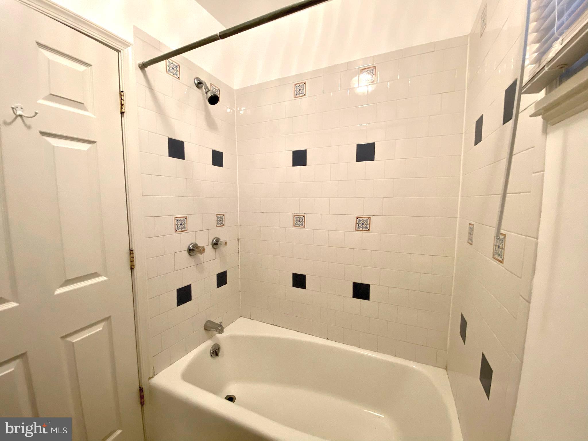 3856 Terrace Street Philadelphia, PA 19128 - Photo 20 of 27 a bathroom with a bathtub and shower
