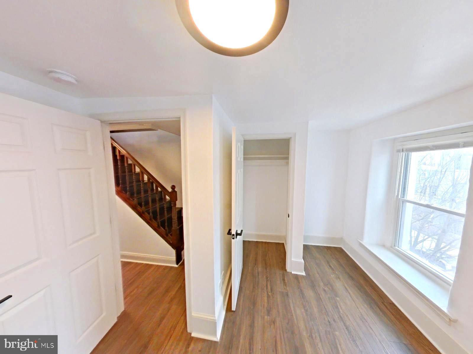 3856 Terrace Street Philadelphia, PA 19128 - Photo 8 of 27 a view of a room with wooden floor and windows