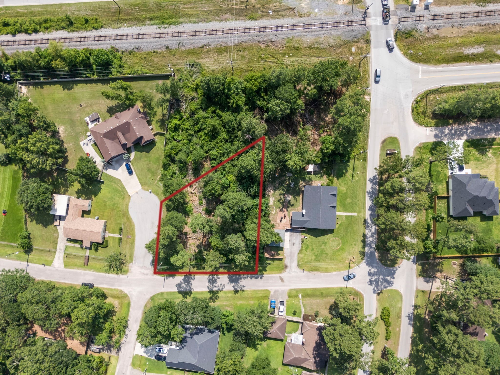 0 Tallow Drive Conroe, TX 77385 - Photo 5 of 11 an aerial view of a house with outdoor space and lake view