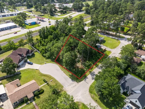 an aerial view of residential house with outdoor space