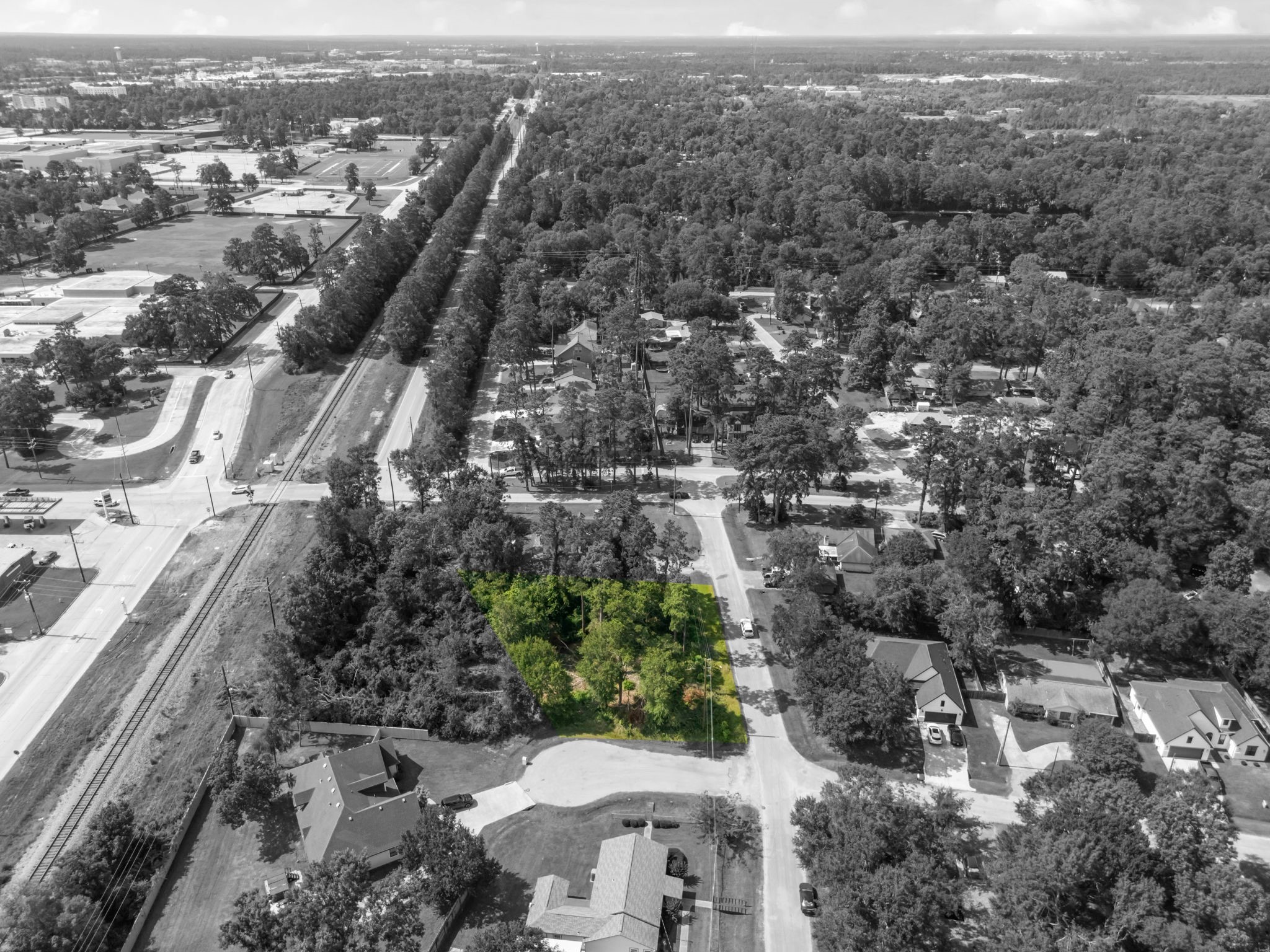 0 Tallow Drive Conroe, TX 77385 - Photo 8 of 11 an aerial view of a city with lots of residential buildings