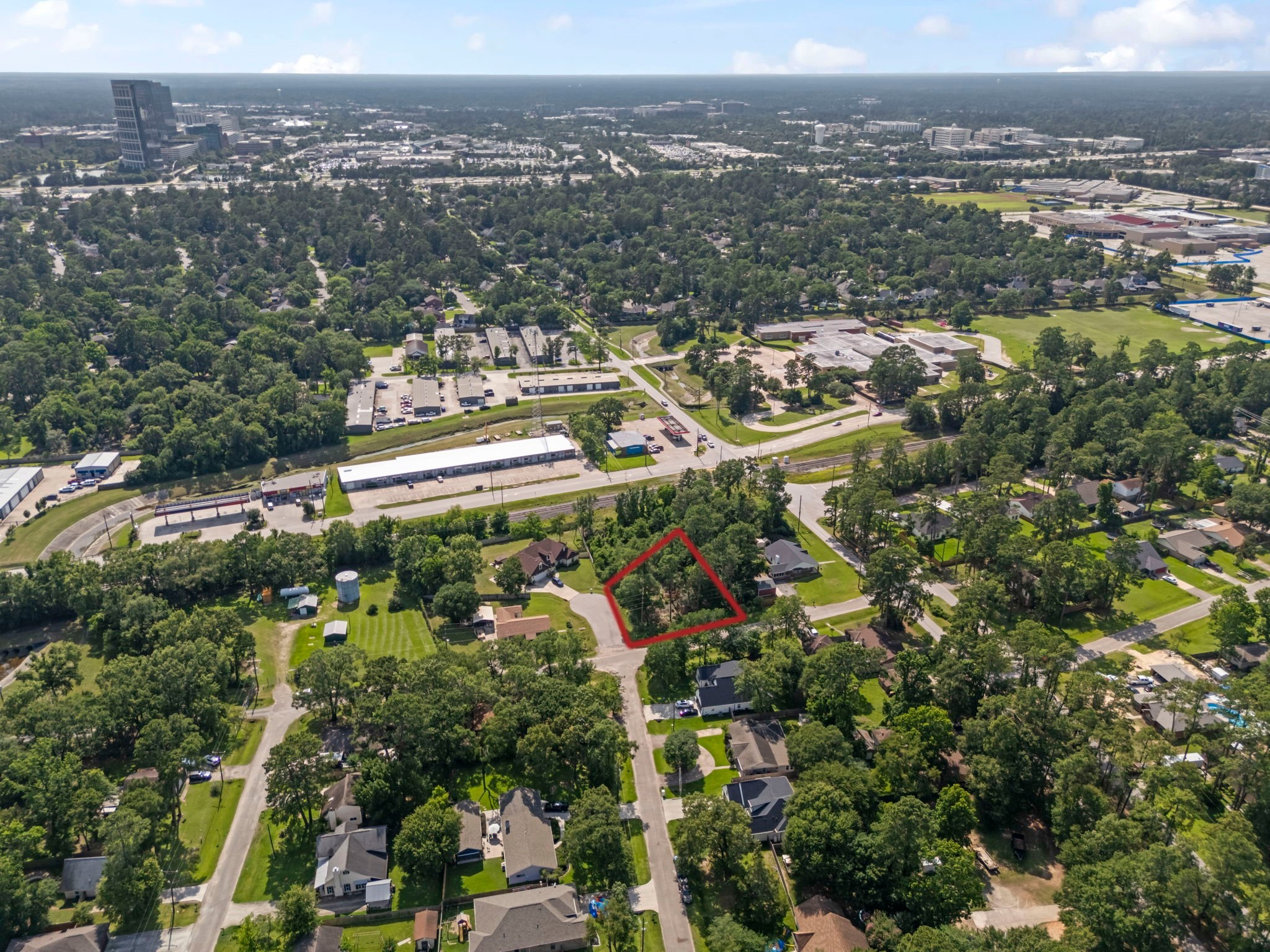 0 Tallow Drive Conroe, TX 77385 - Photo 9 of 11 an aerial view of multiple house