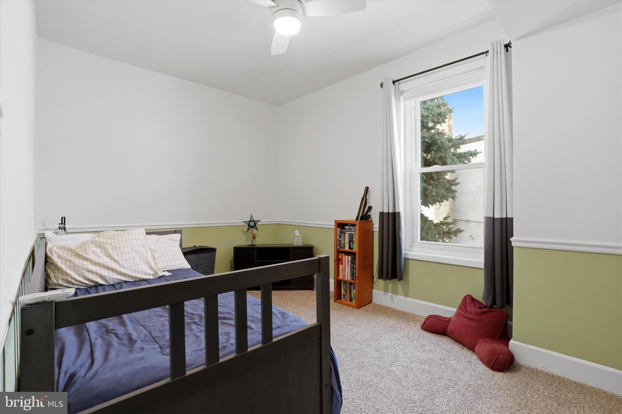 425 Righter Street Philadelphia, PA 19128 - Photo 19 of 35 a bedroom with furniture and a window