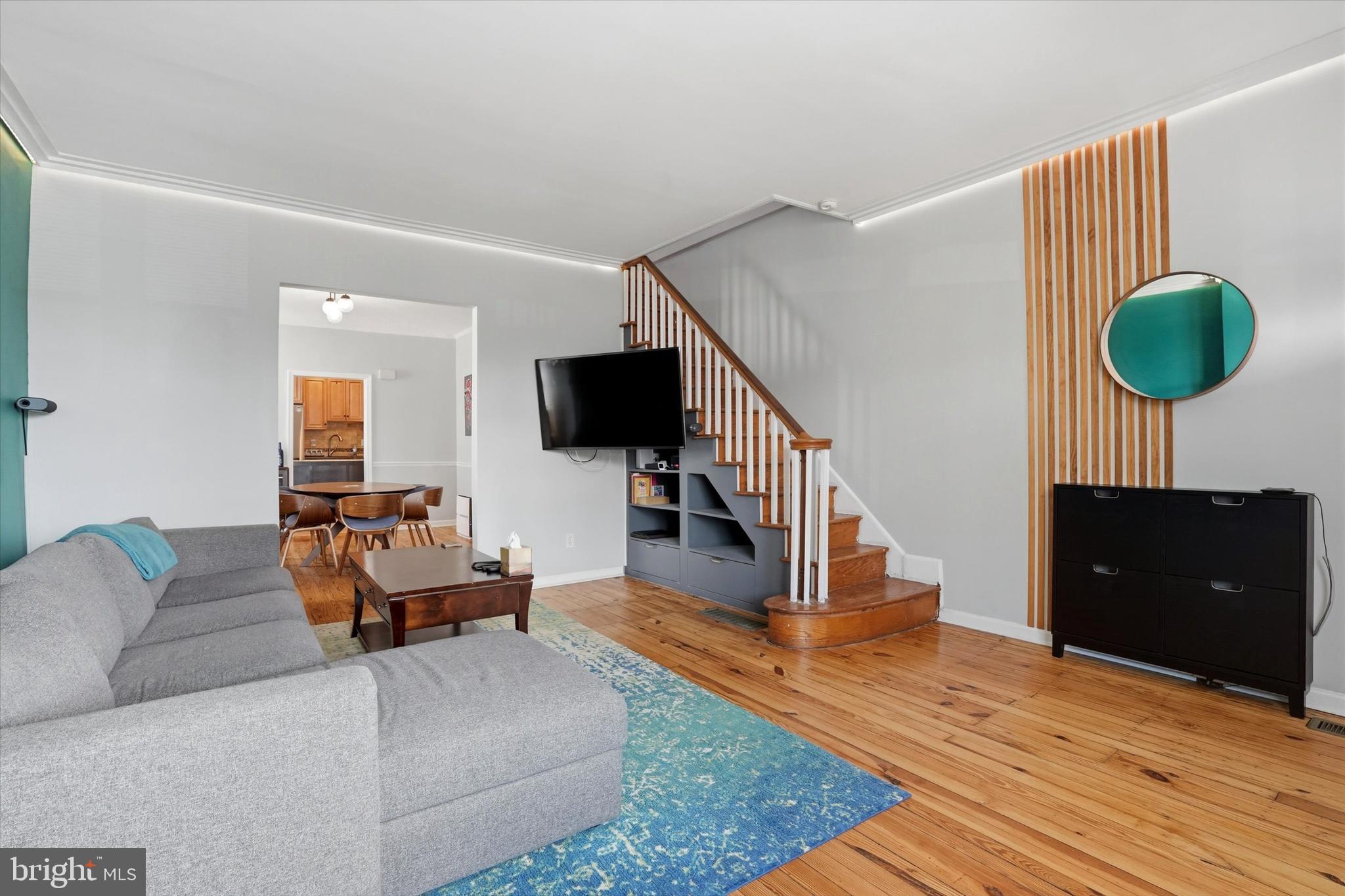 425 Righter Street Philadelphia, PA 19128 - Photo 4 of 35 a living room with furniture and a wooden floor