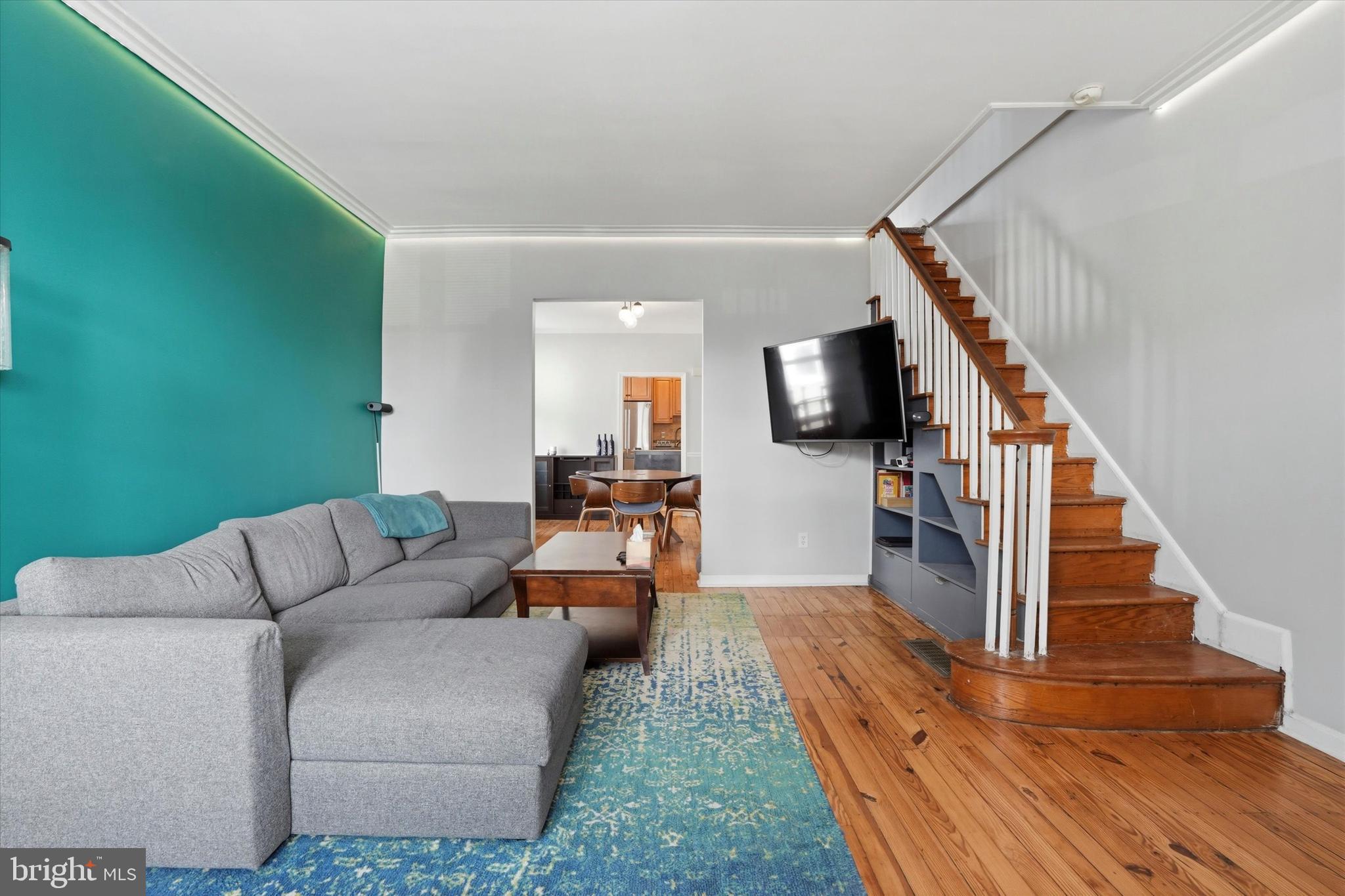 425 Righter Street Philadelphia, PA 19128 - Photo 5 of 35 a living room with furniture and a flat screen tv