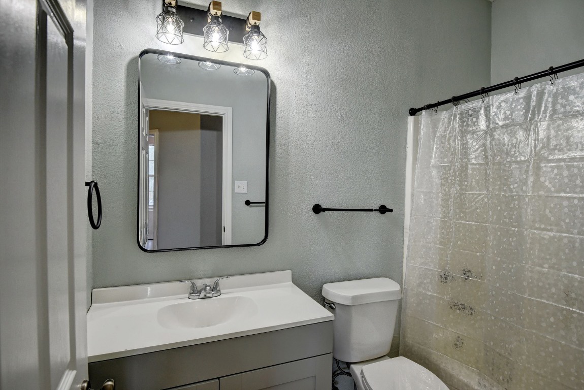 340 Rose Mayer Loop La Grange, TX 78945 - Photo 23 of 30 a bathroom with a toilet sink and shower