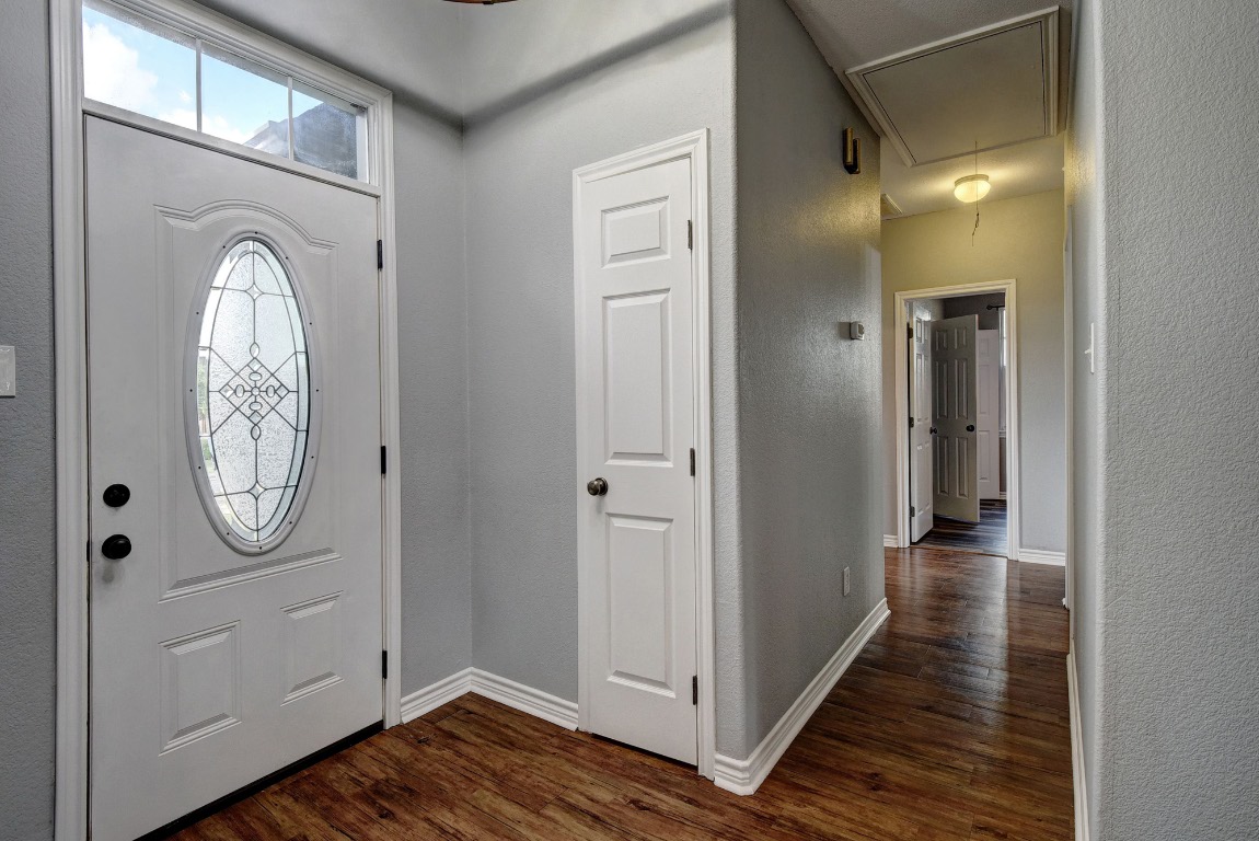 340 Rose Mayer Loop La Grange, TX 78945 - Photo 4 of 30 a view of a hallway with wooden floor