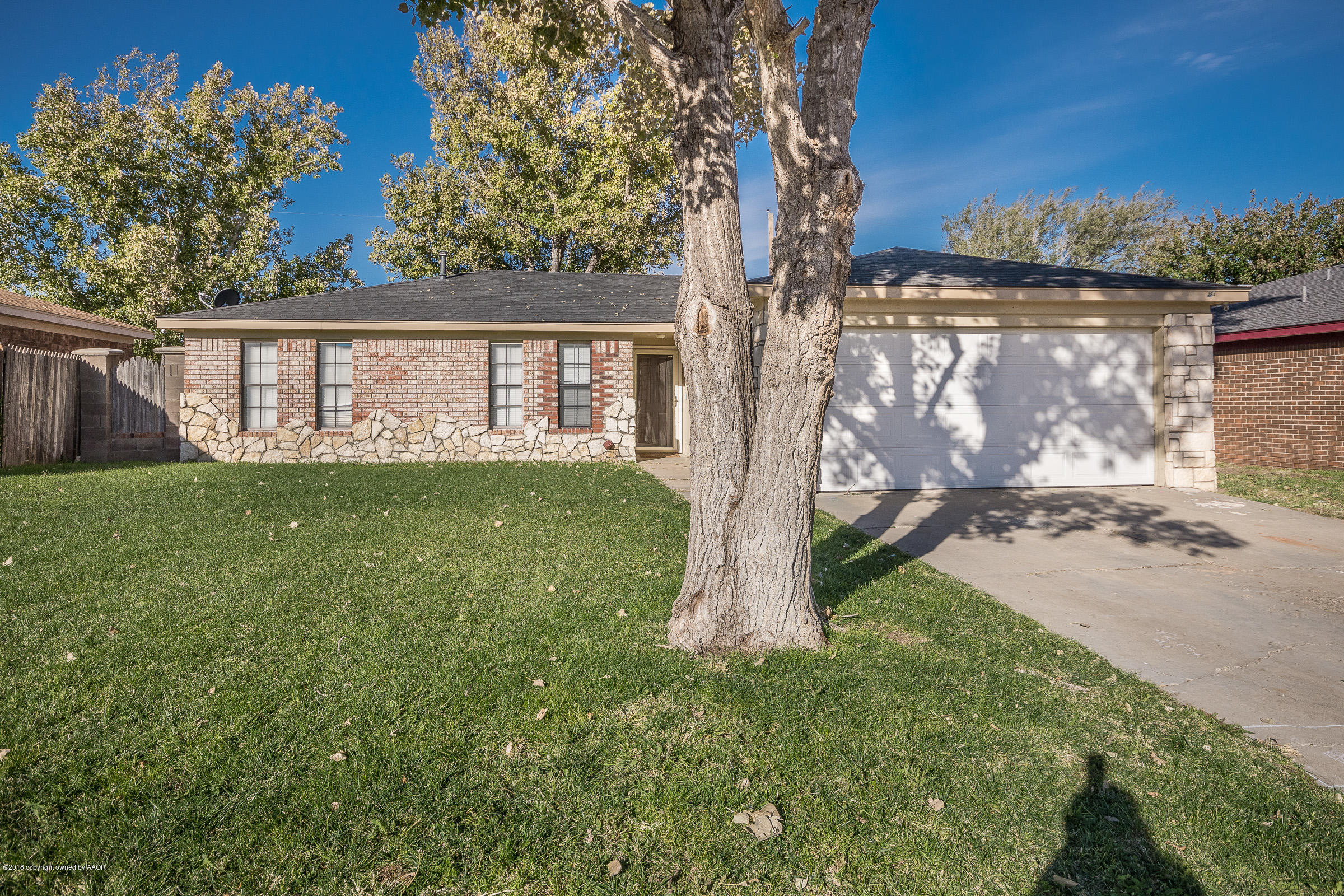 5332 Whitney Lane Amarillo, TX 79110 - Photo 8 of 17 a view of a house with a yard