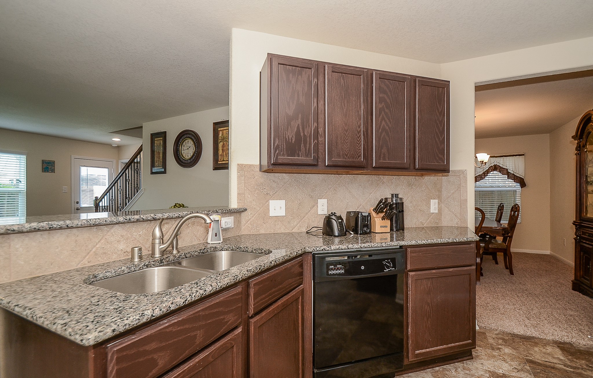 3027 Narrow Stream Way Katy, TX 77493 - Photo 12 of 32 Kitchen with granite countertops