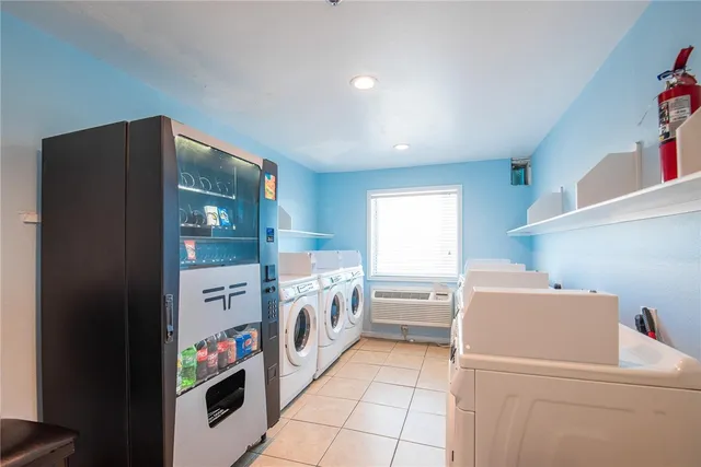 a view of a patio with swimming pool table and chairs